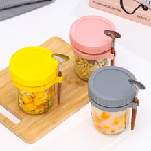 Load image into Gallery viewer, Portable Breakfast Jar with Lid and Spoon Food Storage Glass Jar With Scale for Overnight Oats Leak Proof Cup for Cereal Yogurt Salad Meal Prep On the Go
