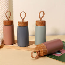 Load image into Gallery viewer, New Style Portable Handheld Stainless Steel Thermos Cup Creative Wood Grain Cover For Outdoor Travel Camping
