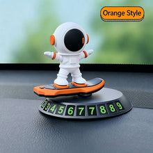 Load image into Gallery viewer, Creative Car Ornament Astronaut Dashboard Parking Sign with Hidden Phone Number Cool Spaceman Figurine for Interior Decoration &amp; Gift
