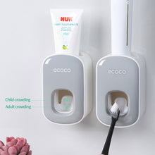 Load image into Gallery viewer, Automatic Bathroom Toothpaste Squeezer Toothpaste Dispenser Dust-proof Toothbrush Holder Wall Mount Stand Bathroom Accessories
