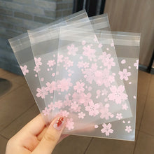 Load image into Gallery viewer, 100pcs Sakura Flower Snack Cookie Sealing Bag Self-Adhesive Wedding Birthday Party Candy Biscuit Packaging Gift Bag
