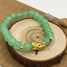 Load image into Gallery viewer, Gold Pixiu Red Agate Transport Evil Spirit Lucky Bracelet Bracelet Feng Shui Piyao Imitation Agate Elastic Couple Bracelet
