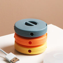 Load image into Gallery viewer, Multifunction USB Cable Storage Box Portable Cable Winder Box Rotatable Earphone Charging Cable Wire Adjustsble Cables Winder
