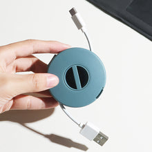 Load image into Gallery viewer, Multifunction USB Cable Storage Box Portable Cable Winder Box Rotatable Earphone Charging Cable Wire Adjustsble Cables Winder
