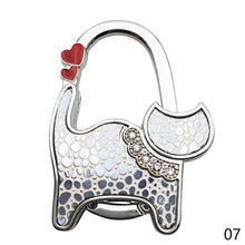 Load image into Gallery viewer, Portable Folding Handbag Hook Holder Purse Hanger Table Edge Hanging Hooks for Handbag Decoration Students Bag Organizer
