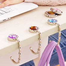 Load image into Gallery viewer, Portable Folding Handbag Hook Holder Purse Hanger Table Edge Hanging Hooks for Handbag Decoration Students Bag Organizer
