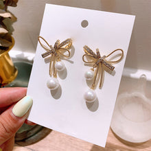 Load image into Gallery viewer, Cutout Bow Pearl Pendant Stud Earrings Bow Diamond Earrings Creative Simple Accessories Jewelry for Women
