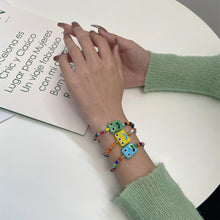 Load image into Gallery viewer, Cute Cartoon Little Monster Colorful Beaded Ceramic Bracelet Creative Rice Beads Elastic Wristband Women Bracelet Jewelry
