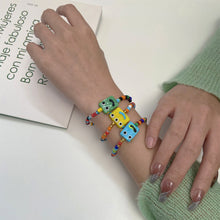 Load image into Gallery viewer, Cute Cartoon Little Monster Colorful Beaded Ceramic Bracelet Creative Rice Beads Elastic Wristband Women Bracelet Jewelry
