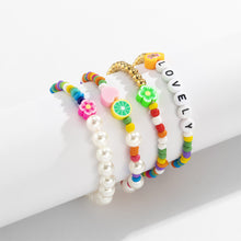Load image into Gallery viewer, 4pcs/set Retro Stitching Soft Clay Small Flower Heart Rice Beads Bracelet Set Temperament Imitation Pearl Heart Letter Bracelet
