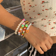 Load image into Gallery viewer, 4pcs/set Retro Stitching Soft Clay Small Flower Heart Rice Beads Bracelet Set Temperament Imitation Pearl Heart Letter Bracelet
