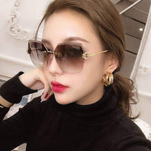 Load image into Gallery viewer, Fashion Frameless Sunglasses UV Protection Sunglasses Simple Personality Sunglasses Outdoor Glasses For Women
