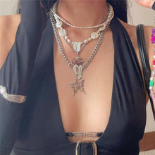 Load image into Gallery viewer, Ins Style V-neck Metal Open Back Crop Top Slim Fit Halterneck Vest With Sleeves Nightclub Party Sexy Lowcut Shirt

