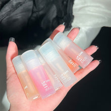 Load image into Gallery viewer, Lip Oil Transparent Lip Gloss Moisturizing Lip Balm Primer Colorless Lip Gloss Lipstick Base Fragrance Non-sticky Moisturizes
