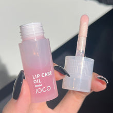 Load image into Gallery viewer, Lip Oil Transparent Lip Gloss Moisturizing Lip Balm Primer Colorless Lip Gloss Lipstick Base Fragrance Non-sticky Moisturizes
