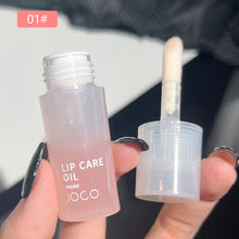 Load image into Gallery viewer, Lip Oil Transparent Lip Gloss Moisturizing Lip Balm Primer Colorless Lip Gloss Lipstick Base Fragrance Non-sticky Moisturizes
