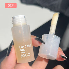 Load image into Gallery viewer, Lip Oil Transparent Lip Gloss Moisturizing Lip Balm Primer Colorless Lip Gloss Lipstick Base Fragrance Non-sticky Moisturizes
