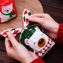 Load image into Gallery viewer, 50Pcs Christmas Gift Bag Santa Claus Print Plastic Bags Baking Candy Packaging Bags Xmas Party New Year
