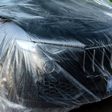 Load image into Gallery viewer, Universal Transparent Car Cover Waterproof Dustproof Disposable Covers Plastic Car Covers Size S-XL
