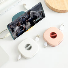 Load image into Gallery viewer, Cable Organizer Rotating Winder Plastic Box Portable Phone Holder Stand Earphone Cord Storage Case
