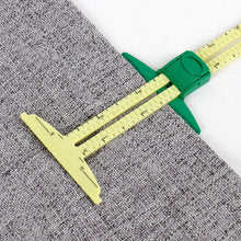 Load image into Gallery viewer, 5-in-1 Multi-functional Sliding Gauge Measuring Sewing Tool Quilting Tools Patchwork Ruler Cloth Cutting Drawing Rulers Tailor Home Use Accessories

