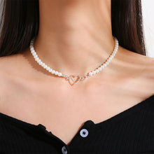 Load image into Gallery viewer, Creative Hollow Heart Pendant Necklace Simple Vintage Alloy Pearl Necklace Clavicle Chain Jewelry Accessory
