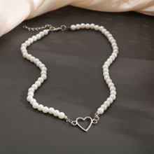 Load image into Gallery viewer, Creative Hollow Heart Pendant Necklace Simple Vintage Alloy Pearl Necklace Clavicle Chain Jewelry Accessory
