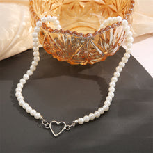 Load image into Gallery viewer, Creative Hollow Heart Pendant Necklace Simple Vintage Alloy Pearl Necklace Clavicle Chain Jewelry Accessory
