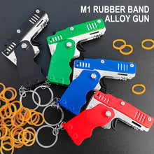 Load image into Gallery viewer, 1Piece M1 Rubber Band Gun Alloy Toy Children's Mini Foldable Toy Shooting Pistol With Keychain Outdoor Party Soft Bullet Gun
