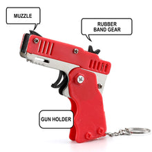 Load image into Gallery viewer, 1Piece M1 Rubber Band Gun Alloy Toy Children's Mini Foldable Toy Shooting Pistol With Keychain Outdoor Party Soft Bullet Gun
